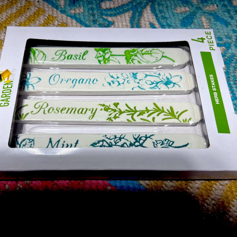 Set of 4 herb stakes (basil, rosemary, oregano, basil) for your pots and garden.